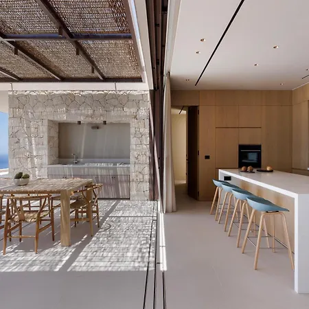 Celestia Cove, Earthy Architecture Meets Endless Blue By Etouri Villa *