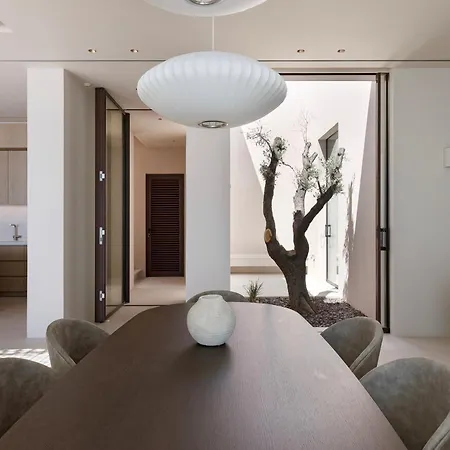 Celestia Cove, Earthy Architecture Meets Endless Blue By Etouri Villa