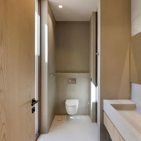 Celestia Cove, Earthy Architecture Meets Endless Blue By Etouri Praszoníszi