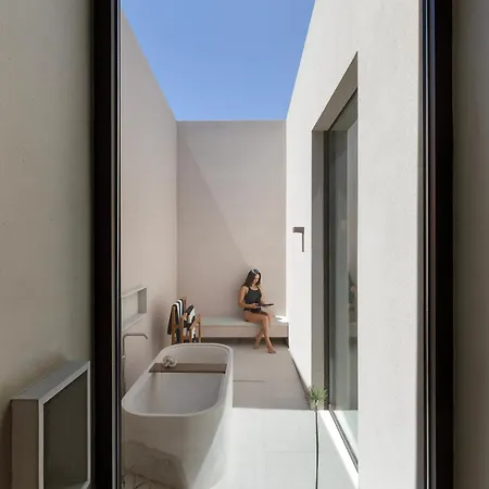 Celestia Cove, Earthy Architecture Meets Endless Blue By Etouri