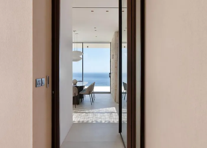 Celestia Cove, Earthy Architecture Meets Endless Blue By Etouri