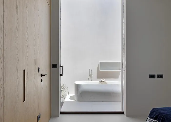 Celestia Cove, Earthy Architecture Meets Endless Blue By Etouri Villa