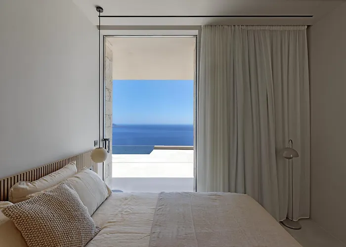 Villa Celestia Cove, Earthy Architecture Meets Endless Blue By Etouri Prasonisi