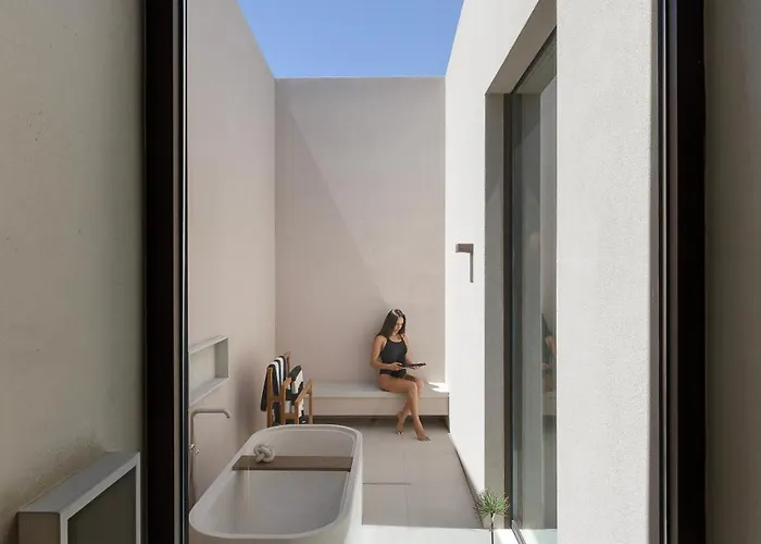 Celestia Cove, Earthy Architecture Meets Endless Blue By Etouri