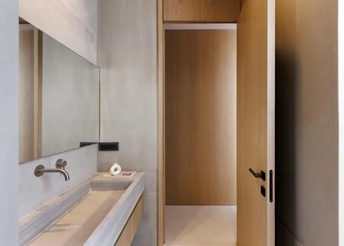 Celestia Cove, Earthy Architecture Meets Endless Blue By Etouri Prasonisi