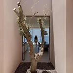Celestia Cove, Earthy Architecture Meets Endless Blue By Etouri فيلة *