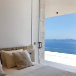 Celestia Cove, Earthy Architecture Meets Endless Blue By Etouri