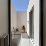 Celestia Cove, Earthy Architecture Meets Endless Blue By Etouri