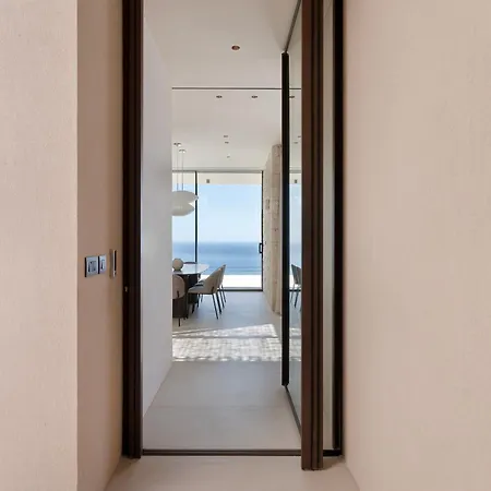 Celestia Cove, Earthy Architecture Meets Endless Blue By Etouri